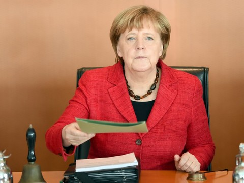 Allemagne: la coalition Merkel s'entend sur un plan moins ambitieux