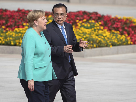 A Pékin, Merkel plaide pour le respect des 
