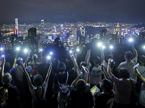 Hong Kong: le militant pro démocratie Joshua Wong demande le soutien de Trump