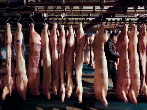 Pékin veut puiser dans ses réserves de porc pour contenir les prix