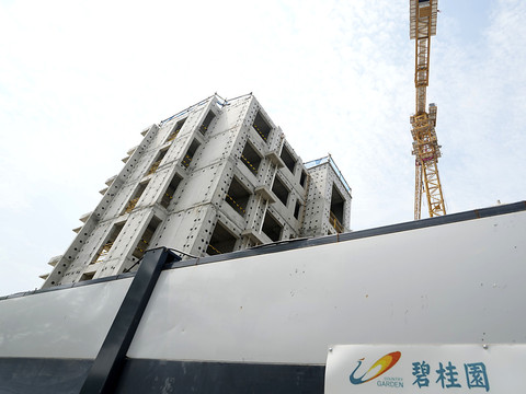 Le FMI moins optimiste pour la Chine, pénalisée par l'immobilier