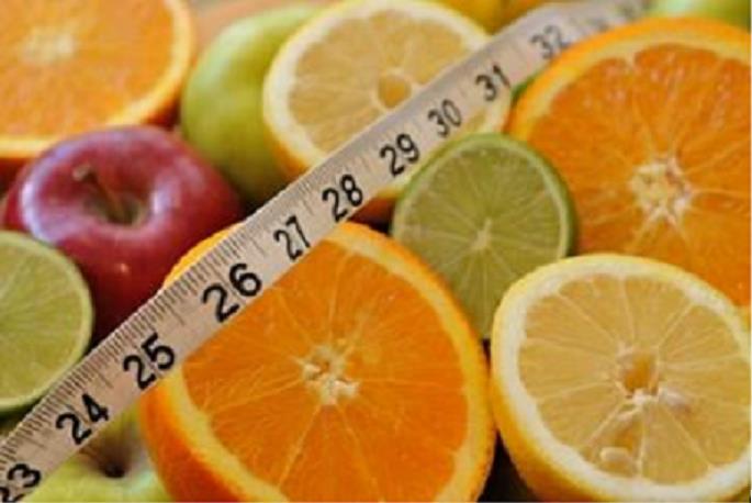 Photo de fruits et un ruban métrique