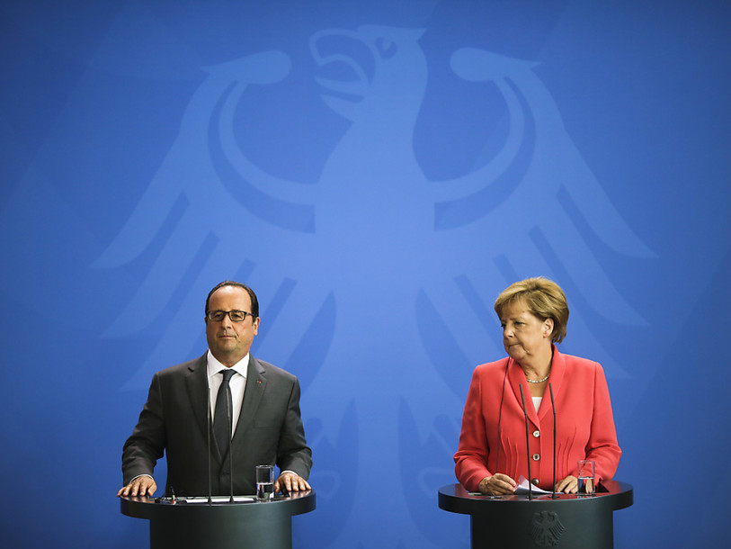 Hollande et Merkel déplorent la poursuite des combats en Ukraine