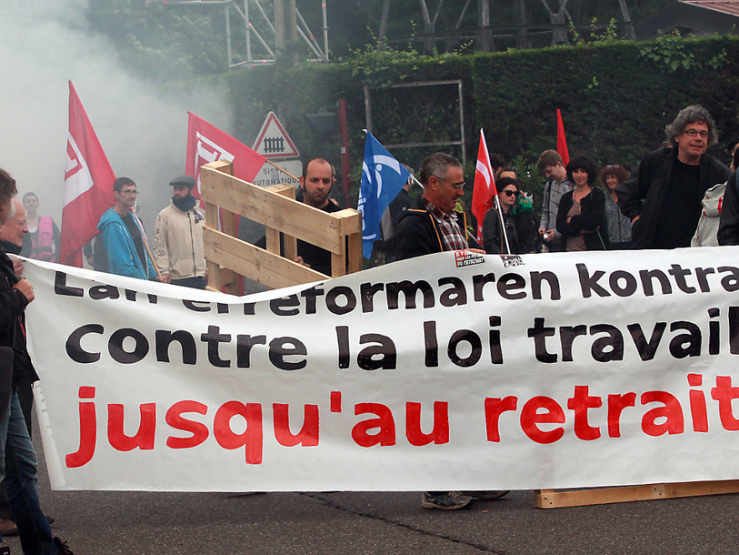 France: Hollande et les syndicats affichent leur détermination
