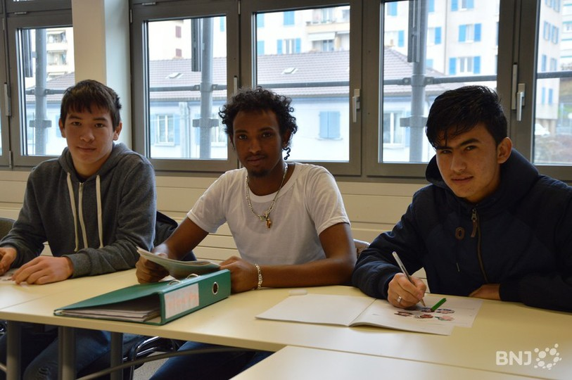 Trois élèves, mineurs non accompagnés, scolarisés au CEFNA à Neuchâtel.