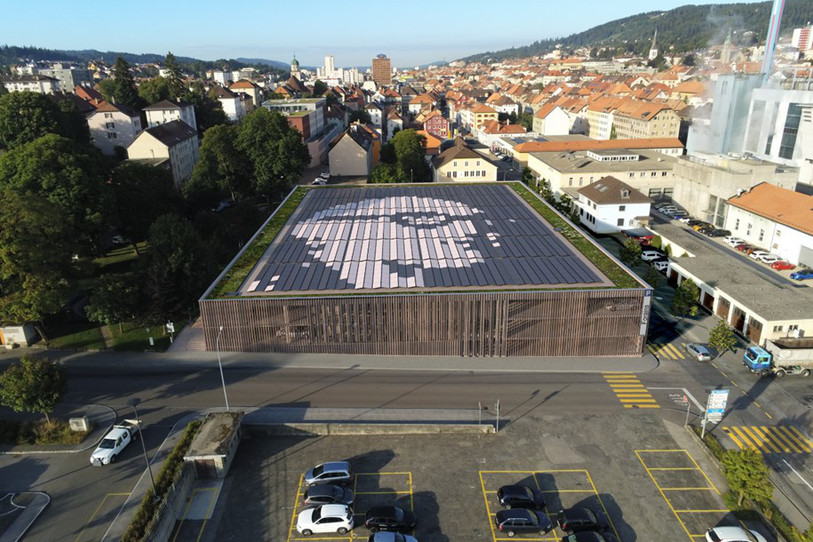 Le Parking de la Ronde est orné de panneau solaire à l’effigie du Corbusier et accueillera 450 places de stationnement, ainsi que 103 ménages. (Photo : Evard Architectes SA)