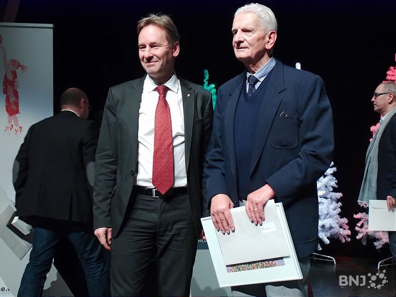 Eric Burkhalter (à droite) lors de la cérémonie du Mérite sportif, aux côtés du conseiller d'Etat Alain Ribaux.