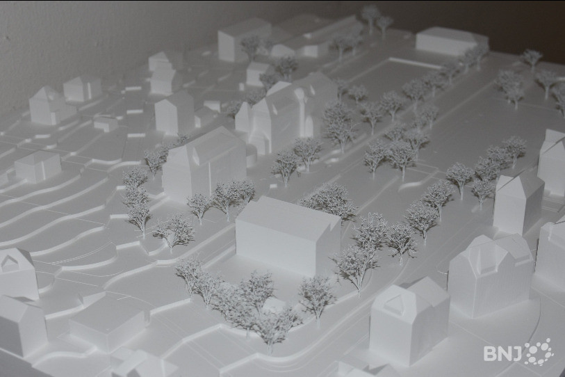 Le projet de nouveau bâtiment retenu prend place dans la zone de l'actuel pavillon.