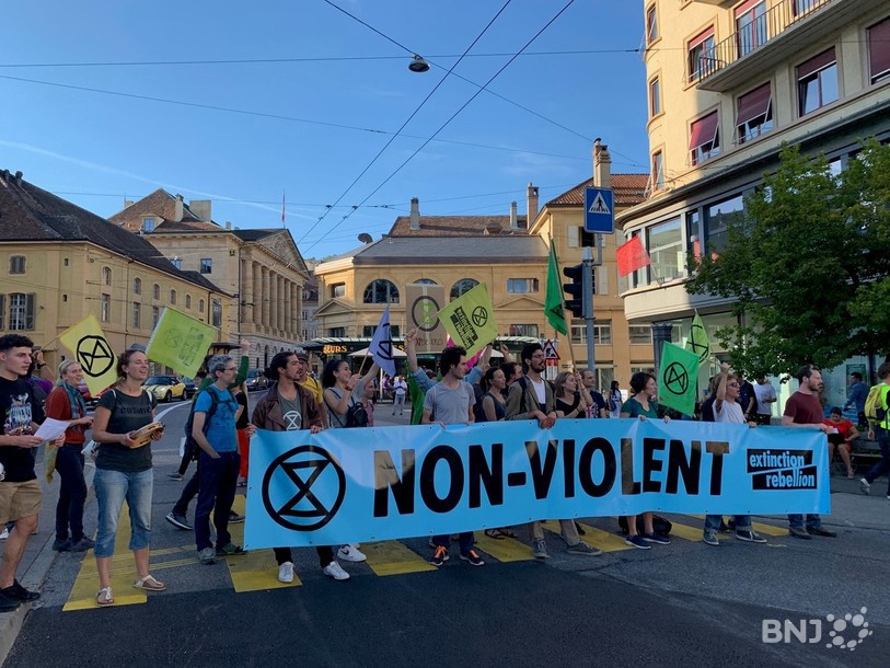 Extinction Rebellion prône la non-violence, comme ici lors d'une manifestation à Neuchâtel. (Photo : archives)