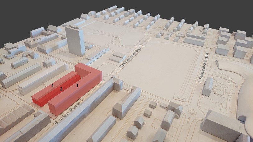 Ici en rouge, vous pouvez voir les lotissements d'utilité publique (1) et les ateliers de la Fondation centre ASI (2). ( Visualisation : Ville de Bienne)