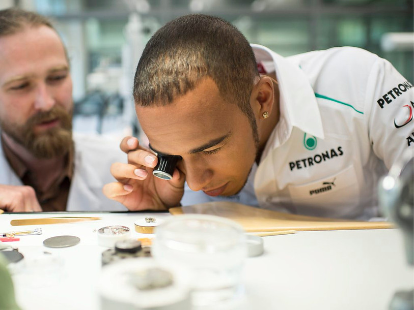 Opposé à Swatch sur l'utilisation de son patronyme par une marque plus que centenaire, Lewis Hamilton prête son image à la marque IWC du concurrent Richemont. (Photo : archives KEYSTONE / Samuel Truempy).