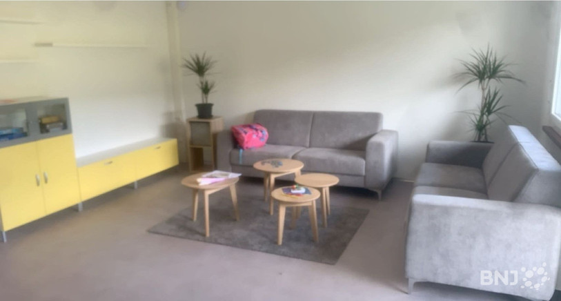 Le salon de l'appartement du GAUO.