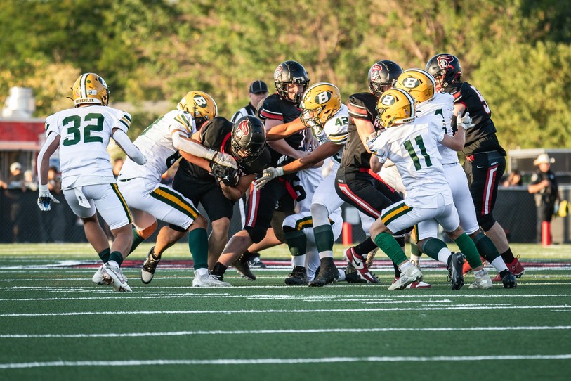 Image prétexte de football américain. Source : Unsplash