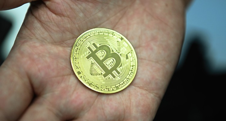Le bitcoin défend bec et ongles la marque des 20'000 dollars