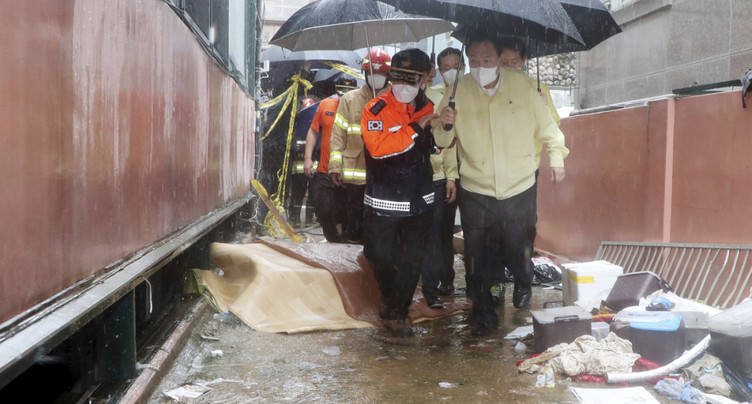 11 morts dans les inondations selon un nouveau bilan